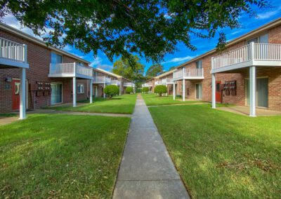 Two Rows Of Two-Story Residential Buildings Facing Each Other