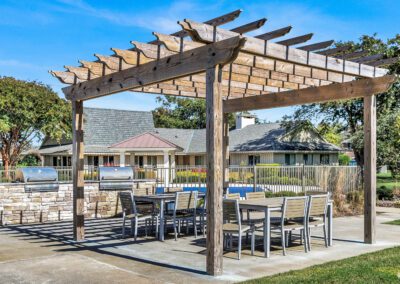 Wooden Pergola Set Over Outdoor Dining Area